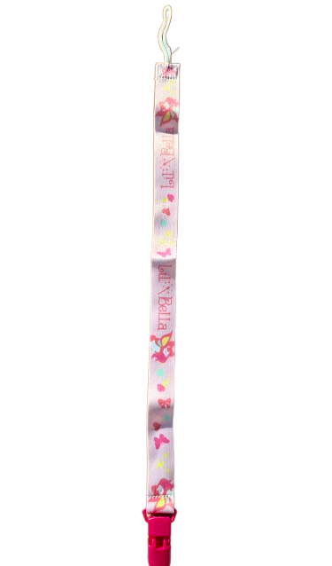 Attache-tétine adulte Rearz Lil’ Bella rose pastel avec motifs arc-en-ciel et pégases.